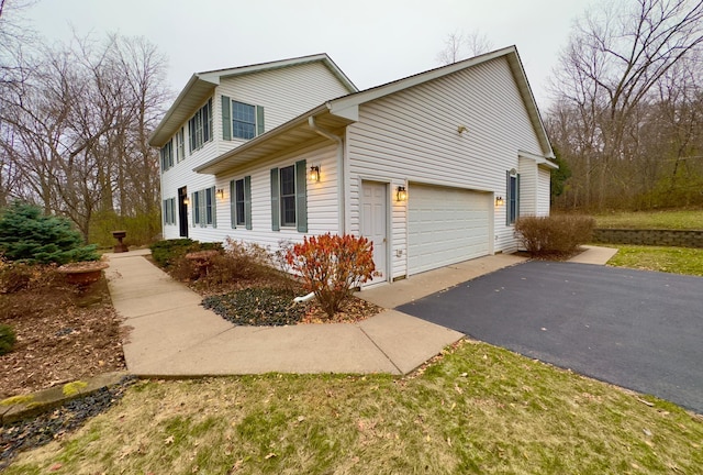 view of property exterior featuring a garage