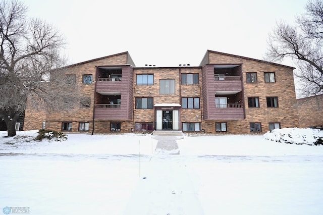 view of snow covered property