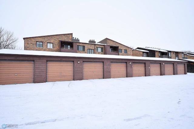 view of snow covered garage