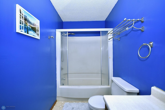 full bathroom with vanity,  shower combination, tile patterned flooring, toilet, and a textured ceiling