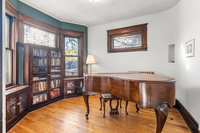 miscellaneous room with light wood-type flooring