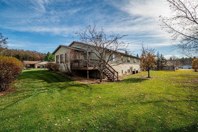 view of property exterior featuring a lawn and a wooden deck