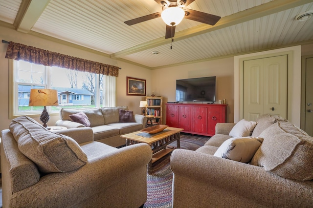 living room featuring beam ceiling and ceiling fan