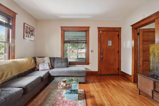2724 Longfellow Ave, Minneapolis, MN 55407 - living area with light wood-type flooring and baseboards