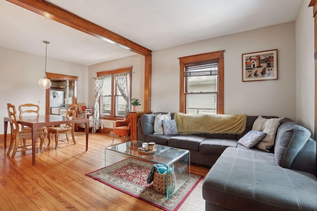 2724 Longfellow Ave, Minneapolis, MN 55407 - living room with light wood-style floors and beam ceiling