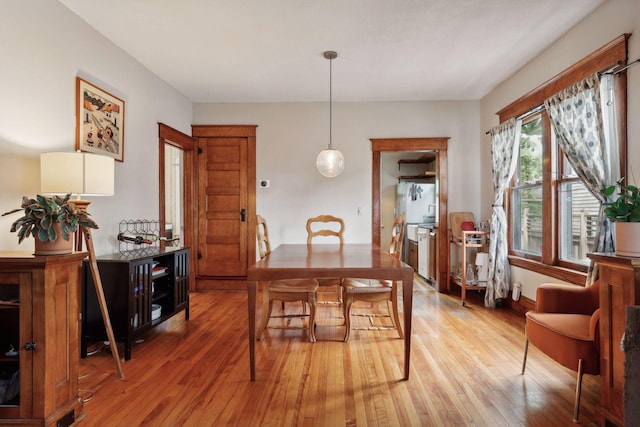 2724 Longfellow Ave, Minneapolis, MN 55407 - dining room featuring light wood-type flooring