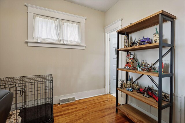 2724 Longfellow Ave, Minneapolis, MN 55407 - corridor featuring hardwood / wood-style flooring and baseboards