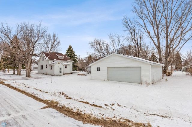 view of snow covered garage