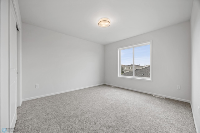 4849 4th St S, Moorhead, MN 56560 - carpeted empty room featuring baseboards