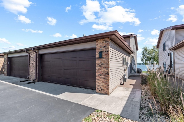 garage featuring a water view