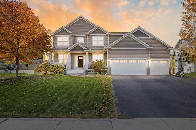 craftsman house featuring a lawn