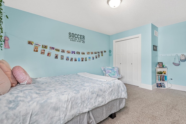 carpeted bedroom featuring a closet