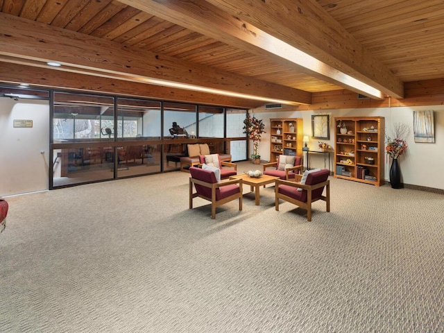 living room with carpet floors, beamed ceiling, and wooden ceiling