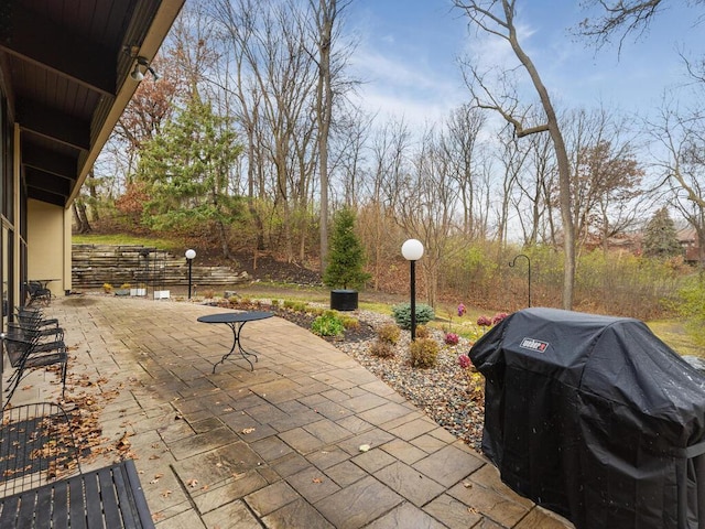 view of patio with a grill