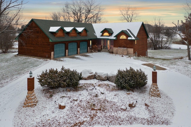 view of front of home with a garage