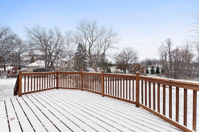 view of snow covered deck