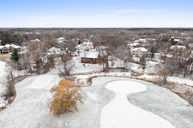 snowy aerial view featuring a residential view