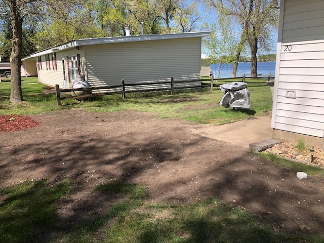 view of yard featuring a water view