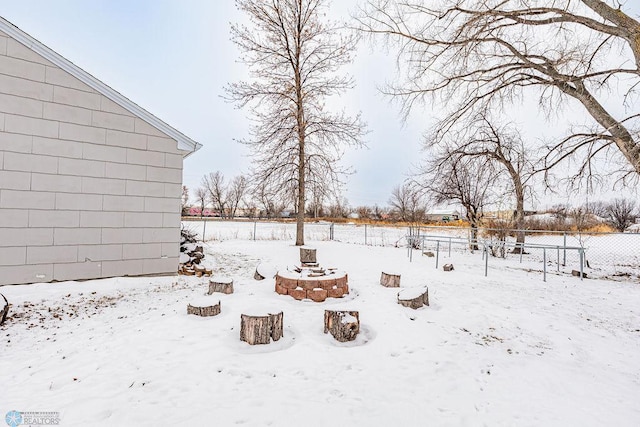 view of yard layered in snow