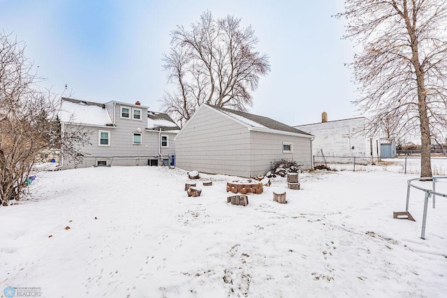 view of snow covered house