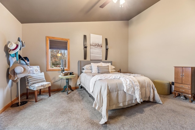 bedroom featuring carpet flooring, ceiling fan, and vaulted ceiling