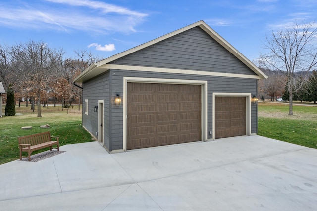 garage with a yard