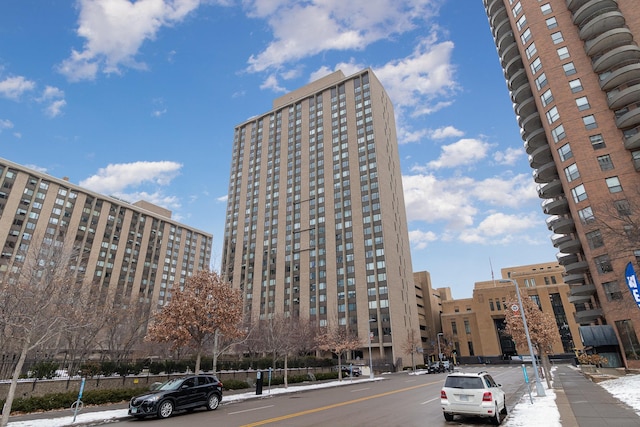 view of building exterior featuring a city view