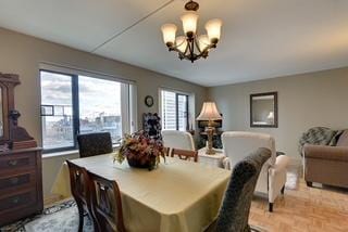 dining room featuring a notable chandelier