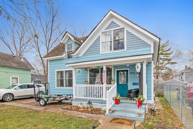 bungalow-style house featuring covered porch