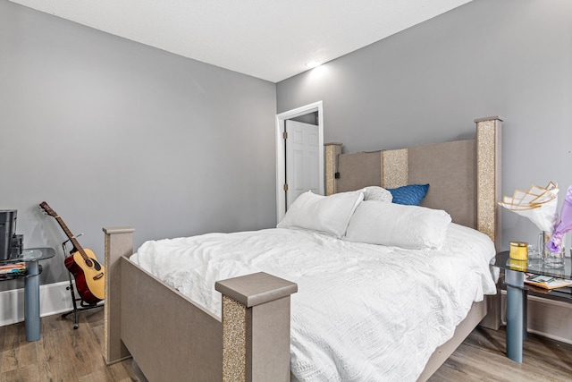 bedroom featuring light hardwood / wood-style floors