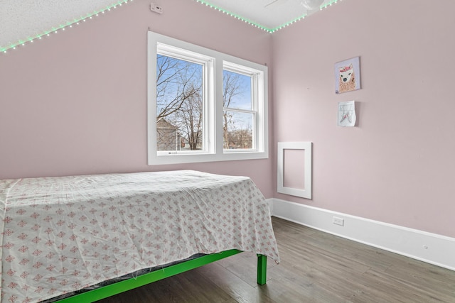 bedroom featuring hardwood / wood-style flooring