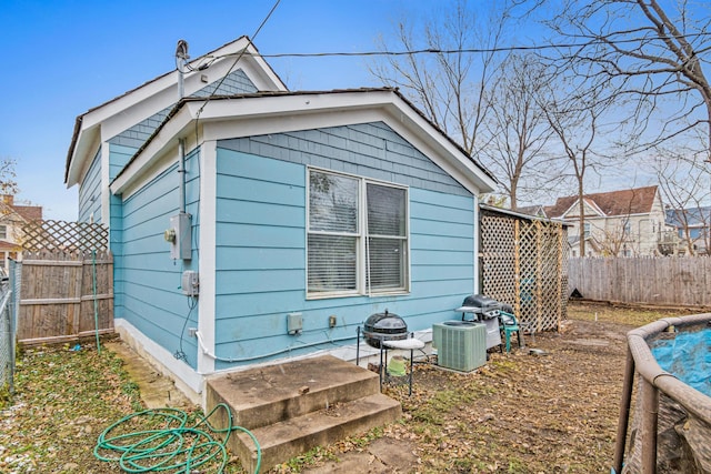 view of outbuilding featuring central AC