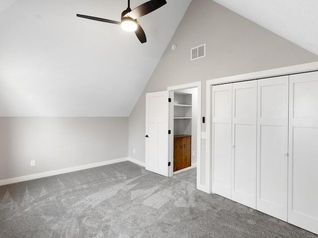 bonus room with ceiling fan, light carpet, and lofted ceiling