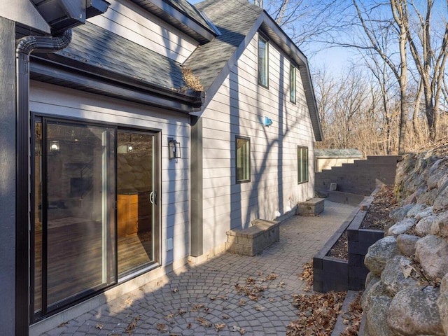 view of home's exterior with a patio area