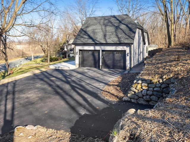 view of home's exterior with a garage