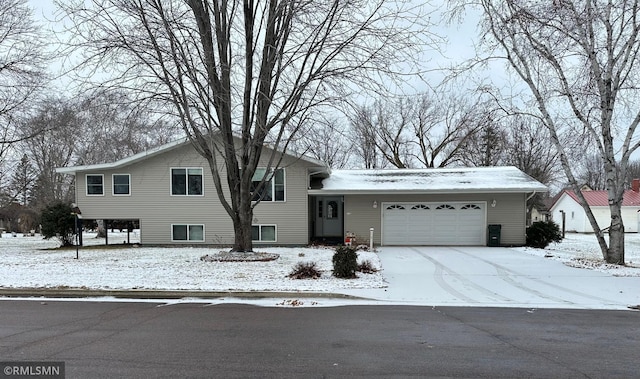 split level home featuring a garage