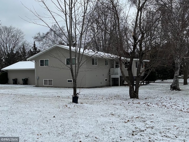 view of snow covered property