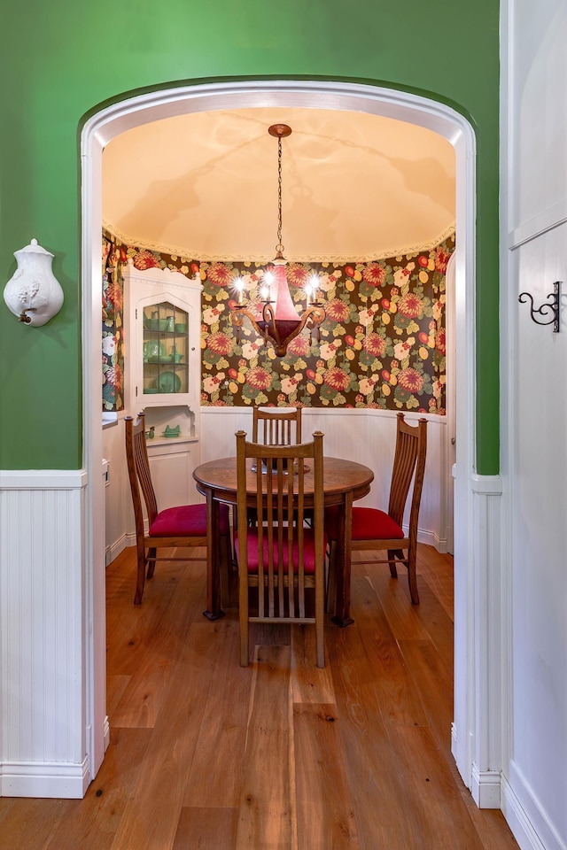 661 Market St, Winona, MN 55987 - dining room with hardwood / wood-style floors and a notable chandelier