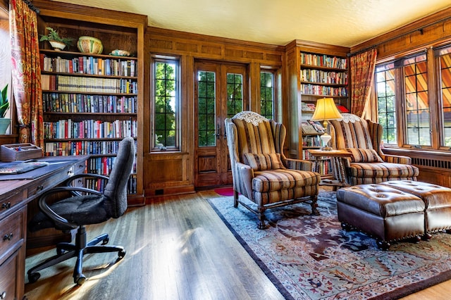661 Market St, Winona, MN 55987 - office space featuring wood-type flooring, plenty of natural light, and wooden walls