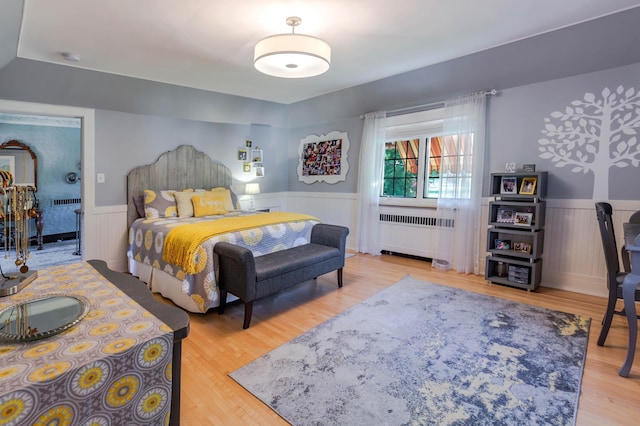 661 Market St, Winona, MN 55987 - bedroom featuring light hardwood / wood-style floors and radiator