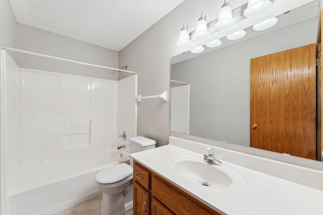 bathroom featuring shower / bath combination, vanity, toilet, and a textured ceiling