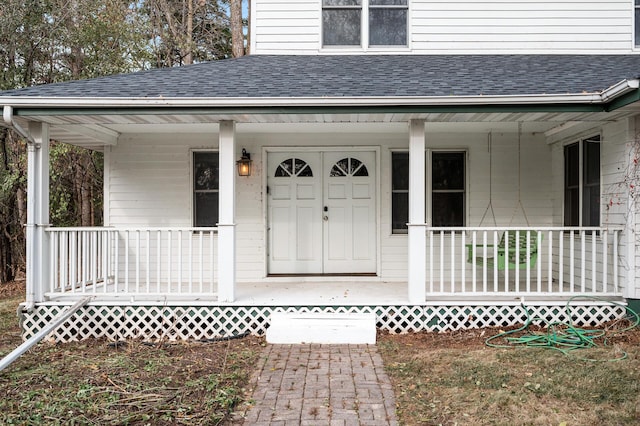 property entrance featuring covered porch