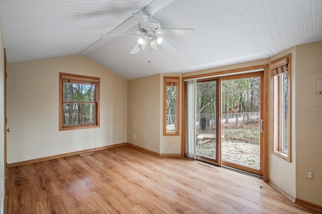 spare room with lofted ceiling, wood ceiling, ceiling fan, and light hardwood / wood-style flooring