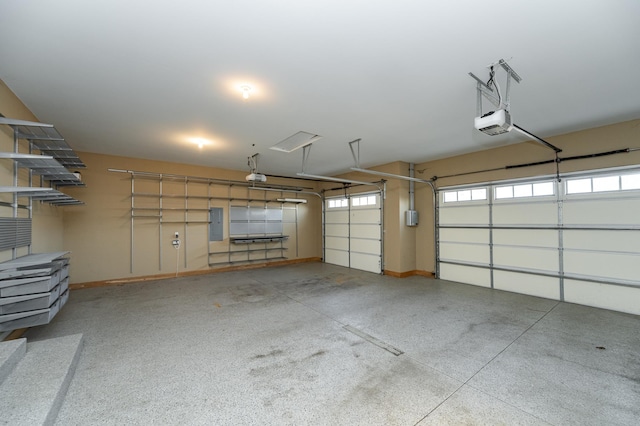 garage with electric panel and a garage door opener