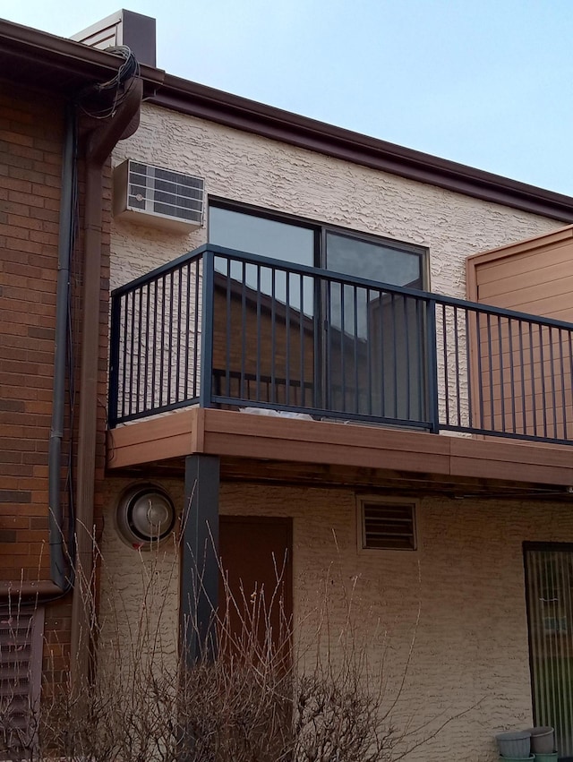 view of property exterior featuring a balcony