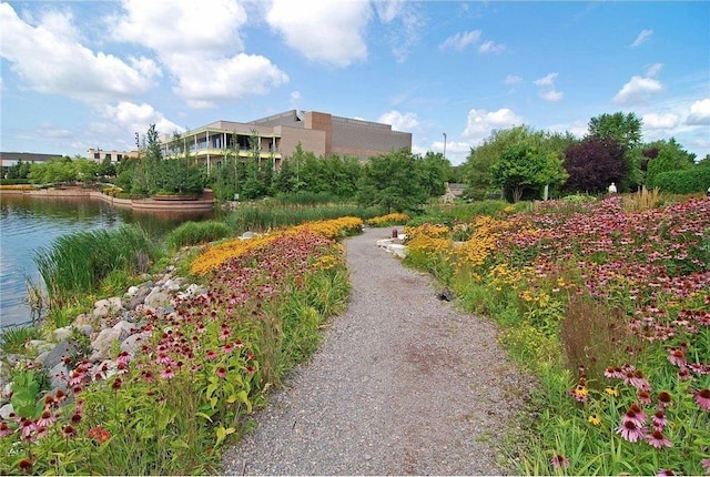 surrounding community with a water view