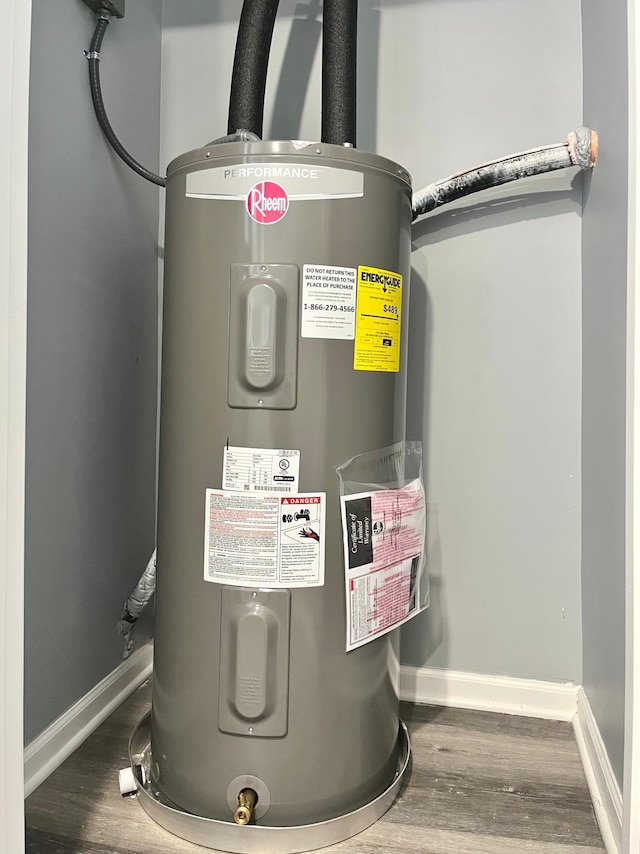 utility room with water heater