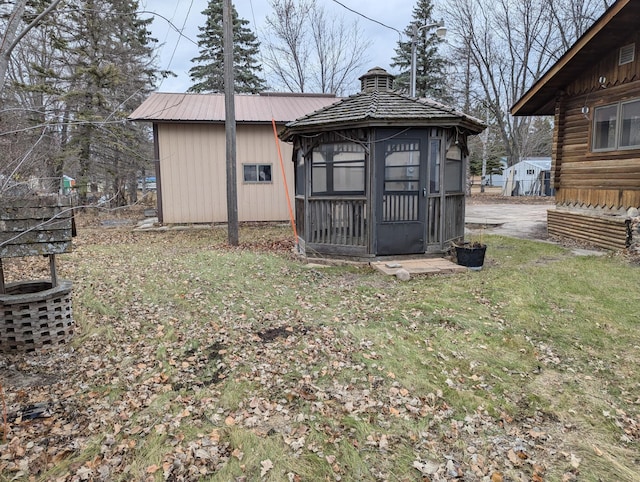 view of outbuilding with a yard