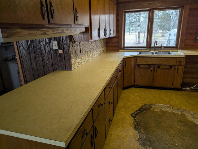 kitchen with decorative backsplash and sink