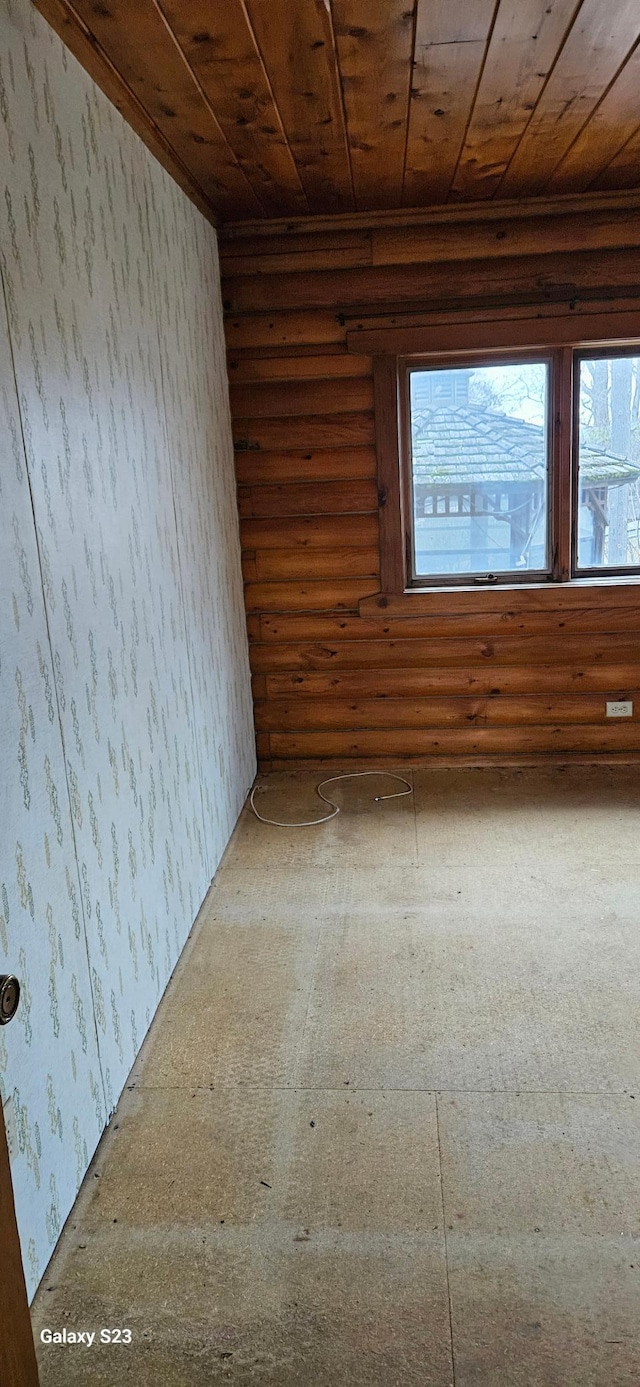 spare room with wooden ceiling